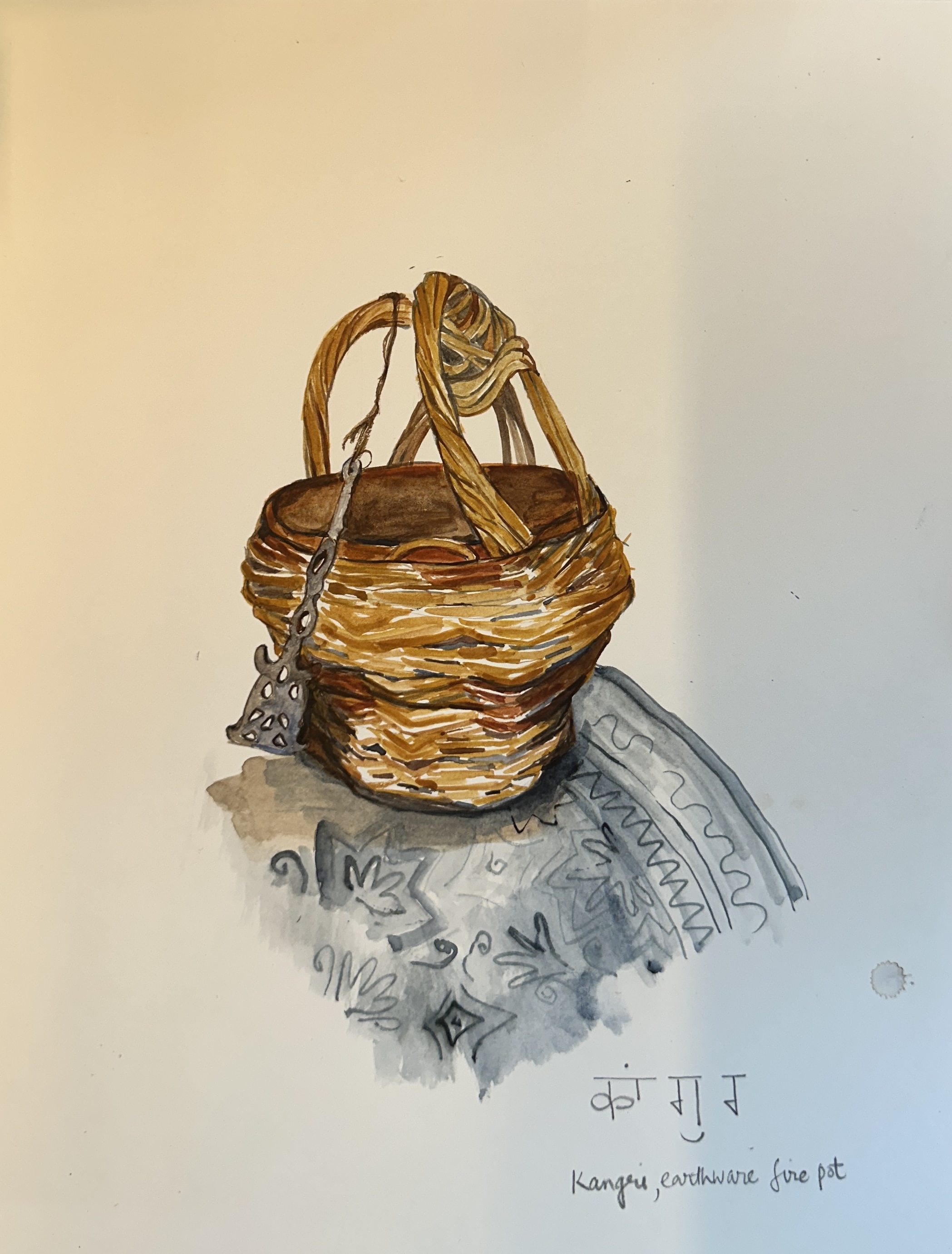 The kangri is a traditional portable firepot that offers warmth and comfort beneath the folds of the phéran during the cold winters of Kashmir. Carried close to the body, it moves with the wearer as a source of heat and survival within the landscape.